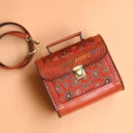 Handcrafted Leather Bag With Ajrakh Block Printed Fabric - Image 3